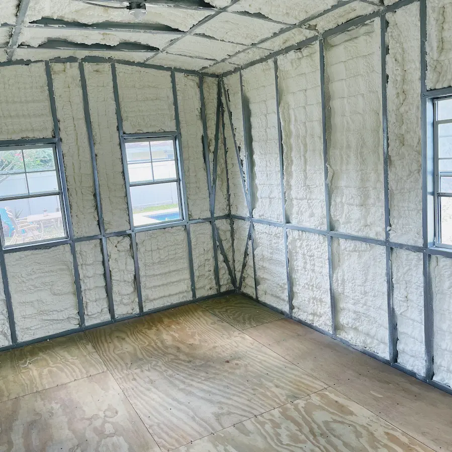 Closed-cell spray foam insulation applied to wall cavities in a residential project in Ocean